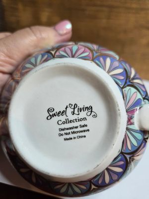 Large sweet living collection tea cup and saucer