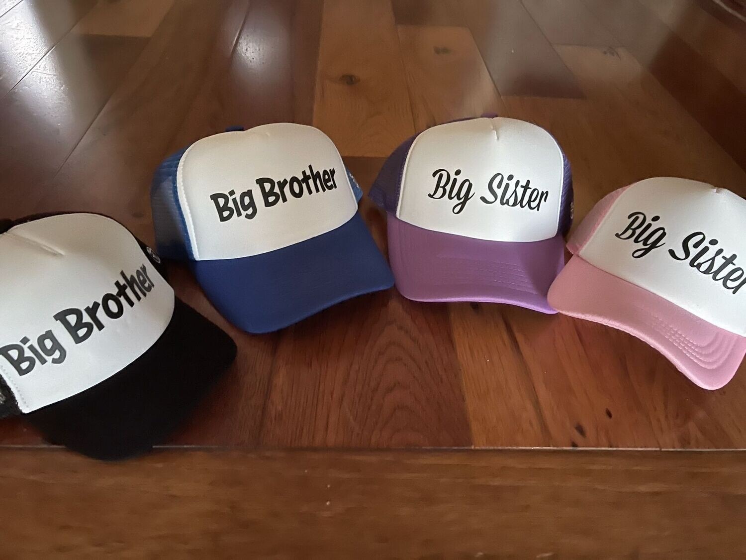 Big brother, Big sister trucker hats