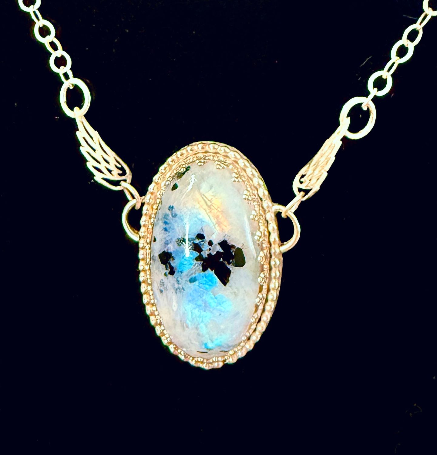 Rainbow Moonstone Silver Winged Necklace (Glow-in-the-dark)