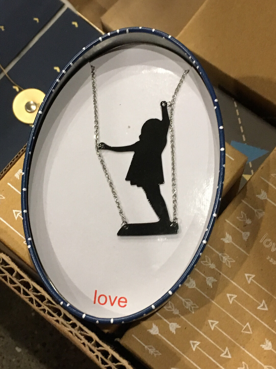 Lovehate NL Silhouette Girl In Swing Necklace . Love. In Tin