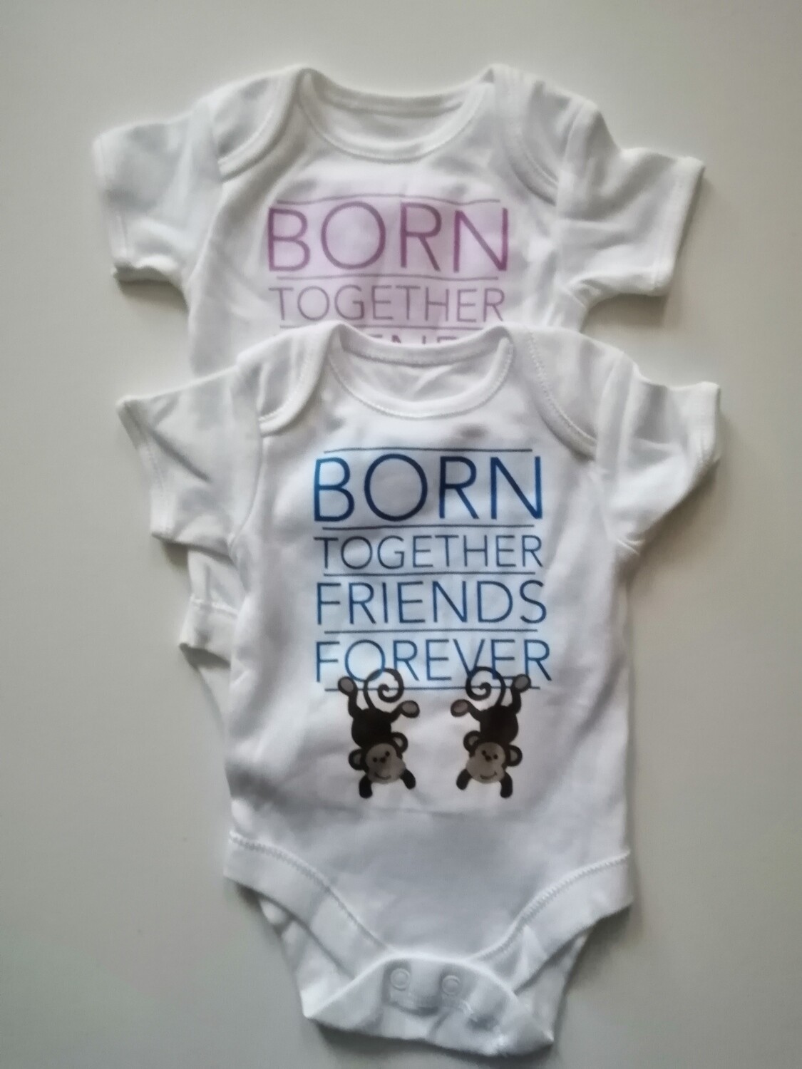 Newborn bodysuits (0-3)months