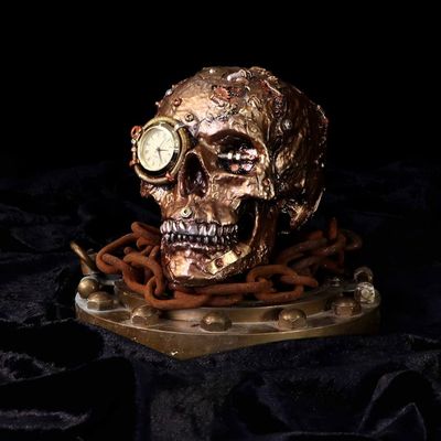 #166N Bronze Scrapped Skull Figurine