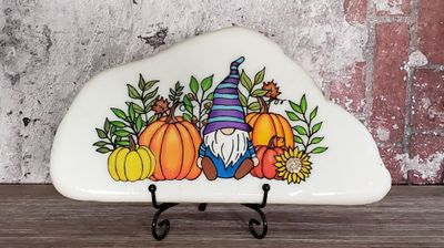 Gnome in a pumpkin patch painted stone