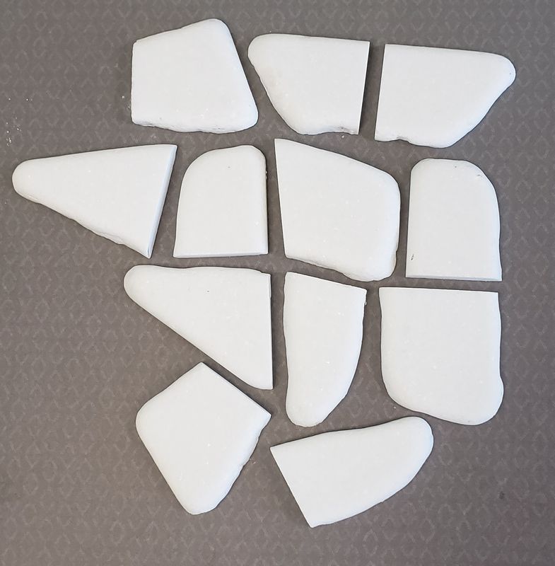 12 irregular Santorini stone tiles