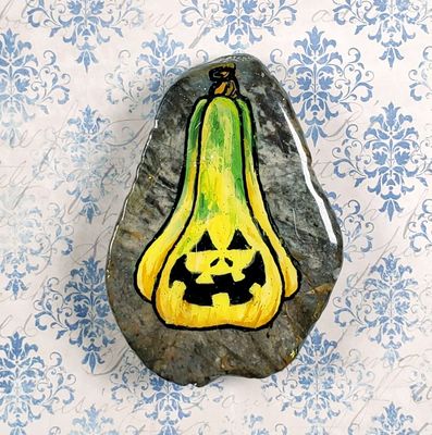 Orange jack-o-lantern gourd