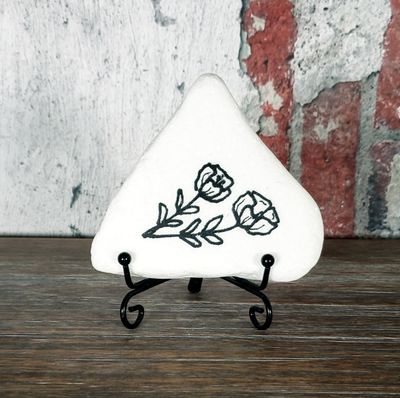 Twin flowers engraved Santorini stone