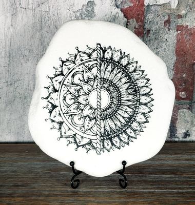 Two mandalas split with rope