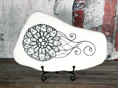 Floral mandala with tail