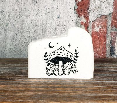 Amanitas under a crescent moon