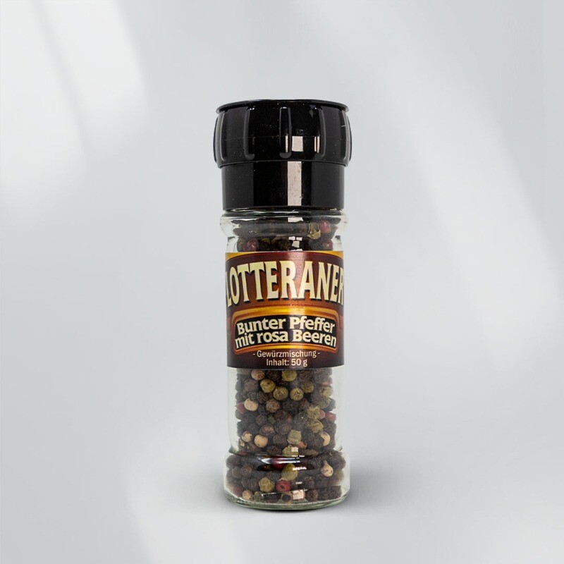 Bunter Pfeffer mit rosa Beeren in der Gewürzmühle