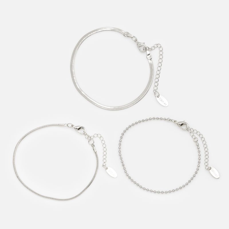 Trio de bracelets argentés à mailles variées