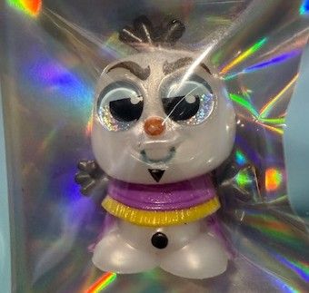 Olif portraying different characters: Doorable and More Disney