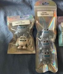 Olif portraying different characters: Doorable and More Disney