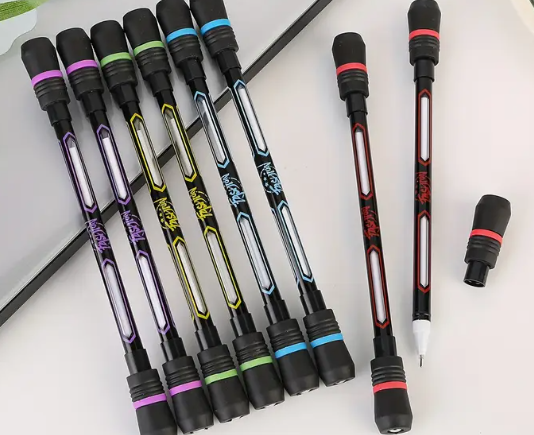 Neutral Pens with rotating designs.