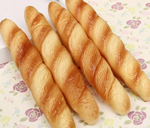 Imitation bread and crescent ballpoint pen.