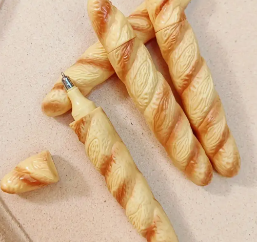 Imitation bread and crescent ballpoint pen.