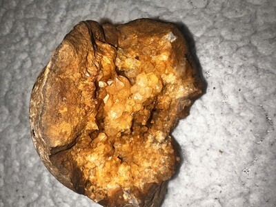 Broken citrine geode