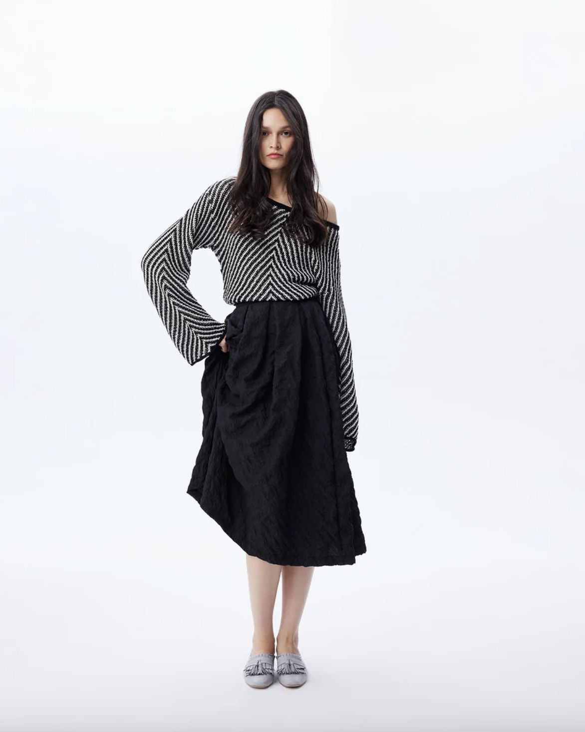THEO The Label Calypso Pleated Midi Skirt