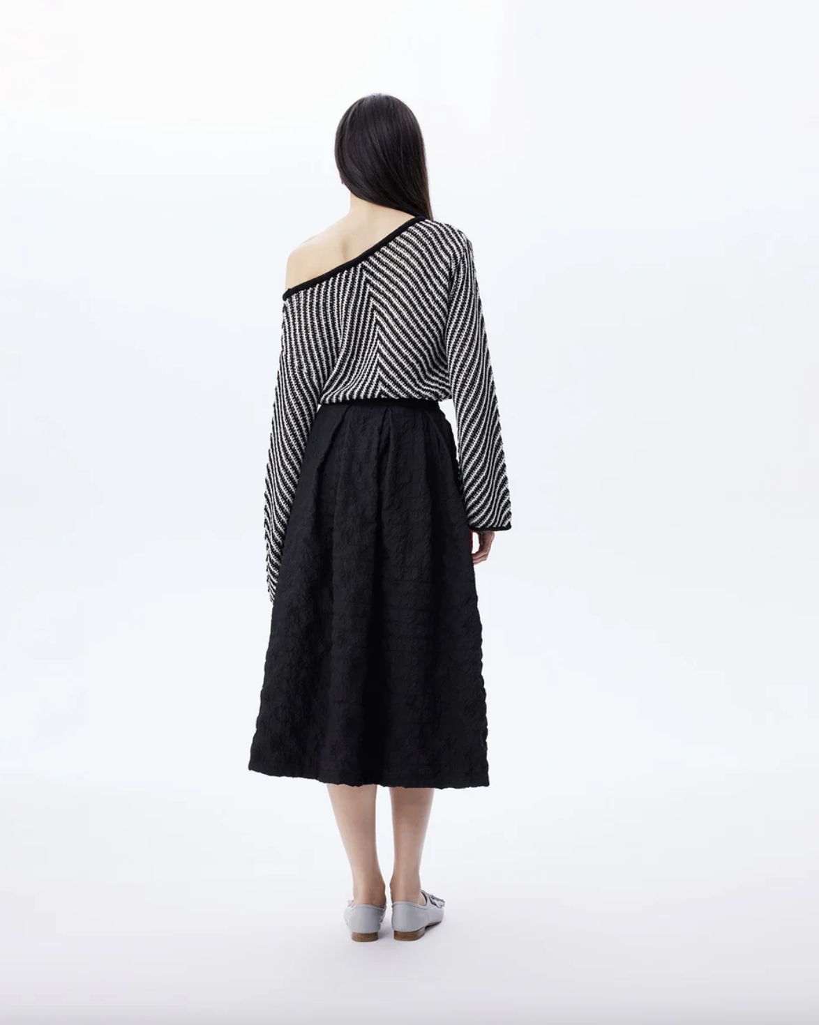 THEO The Label Calypso Pleated Midi Skirt