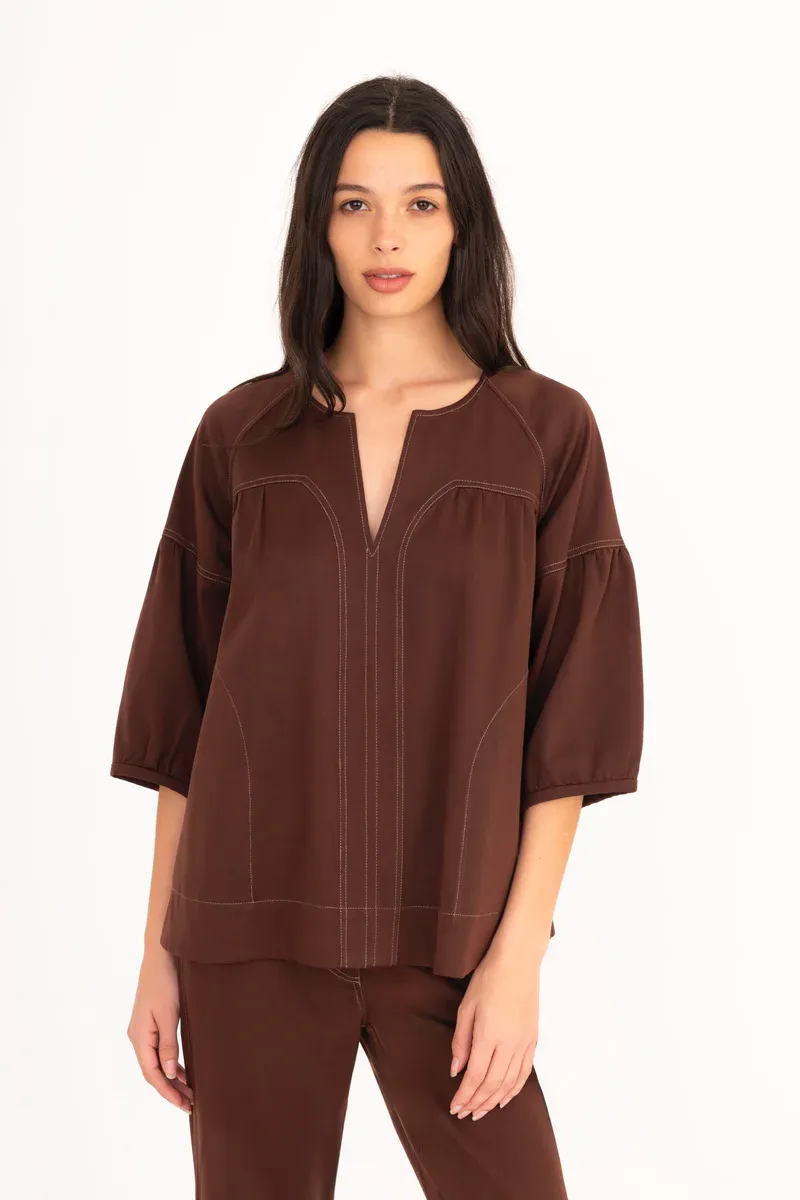 Elaine Kim Evora in Mahogany