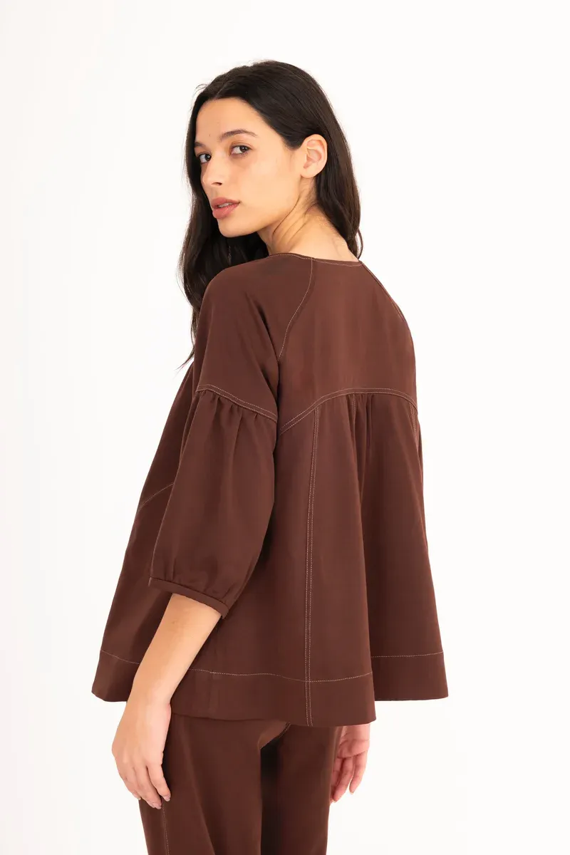 Elaine Kim Evora in Mahogany