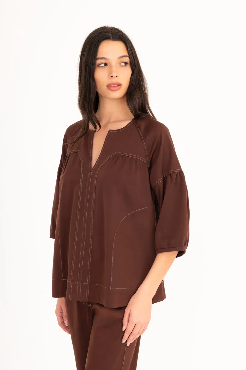 Elaine Kim Evora in Mahogany