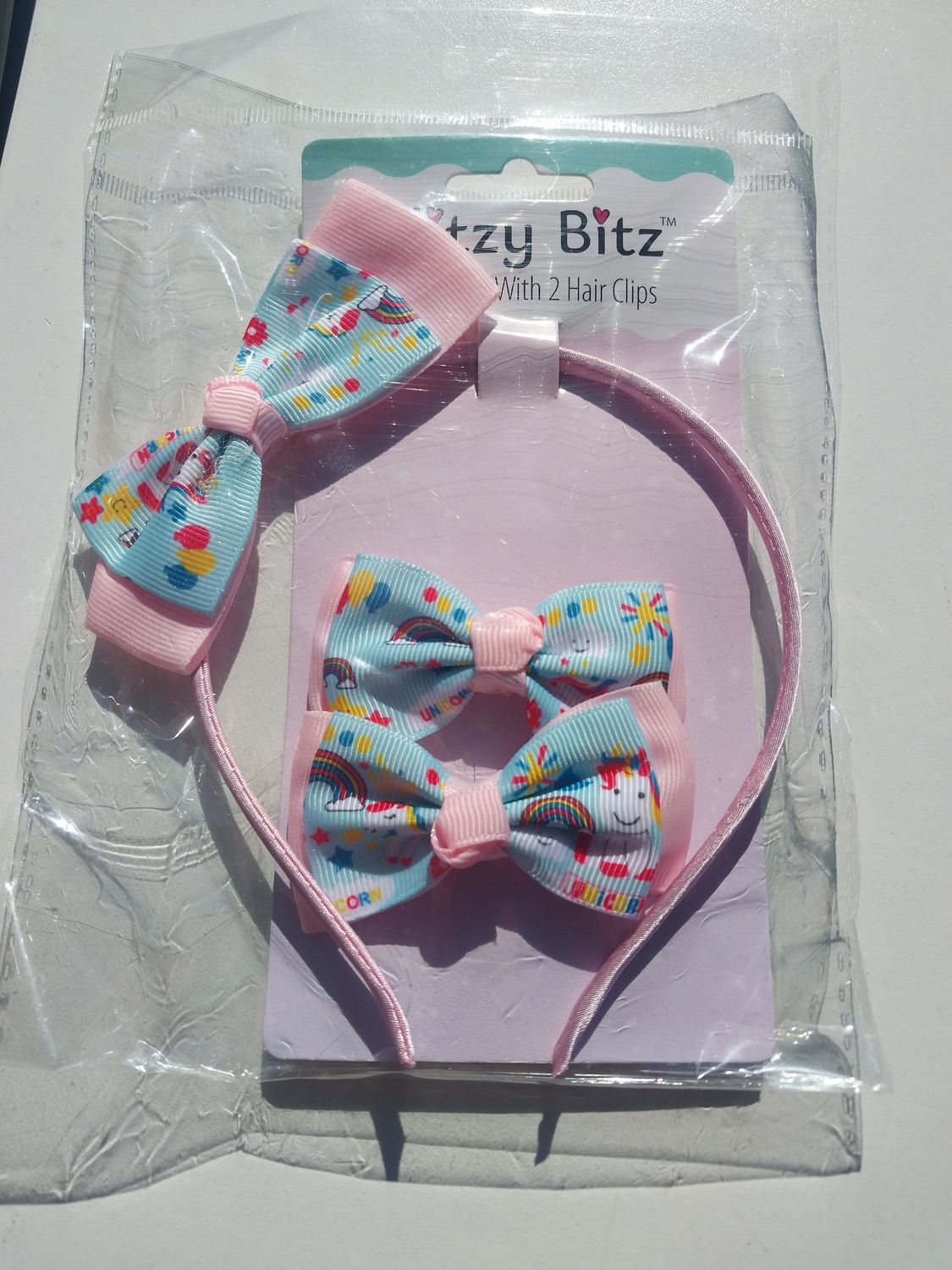 Head band with 2 hair clips