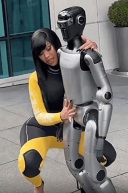 Cardi B Takes a Tumble While Dancing on Robot in San Francisco Ahead of Super Bowl LX