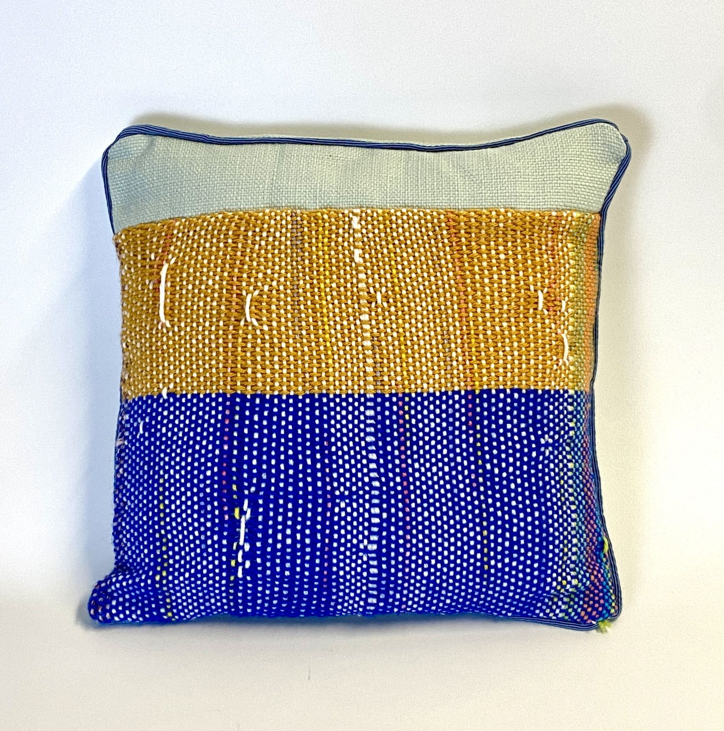Cricket loom weaving pillow by Ania Lattie