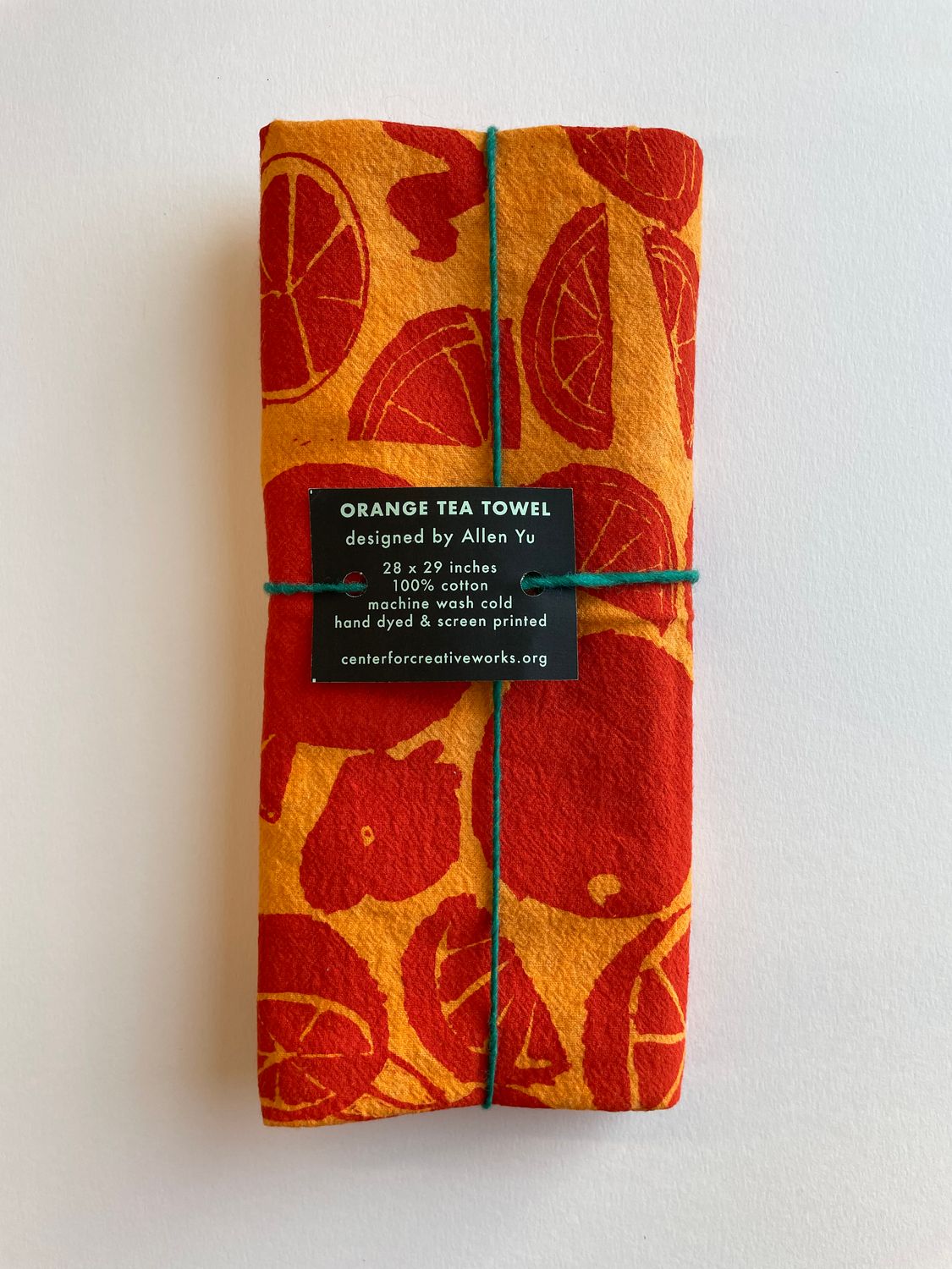 Oranges Tea Towel (large) by Allen Yu