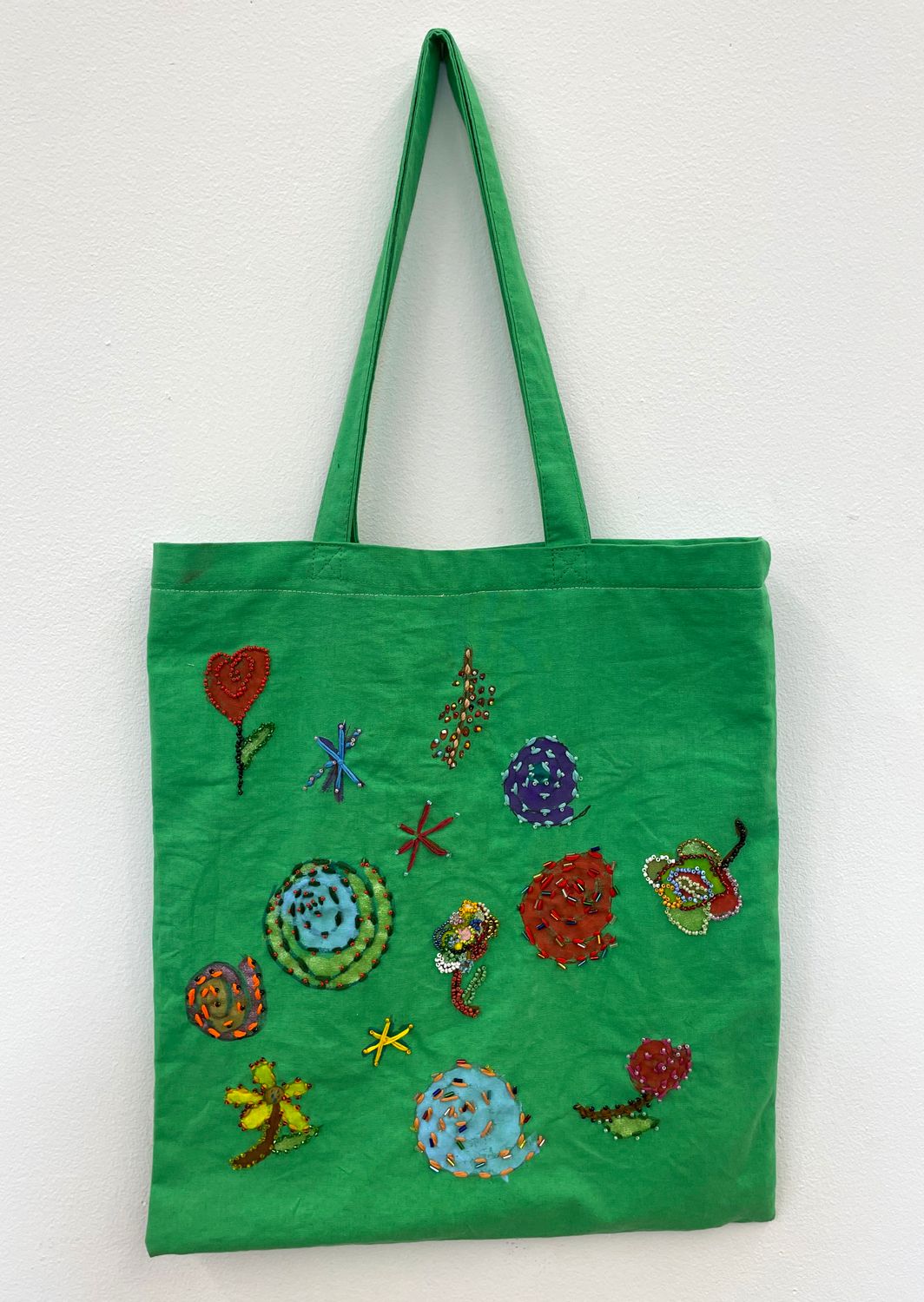 embroidered and beaded tote bag by Keishla Rosado