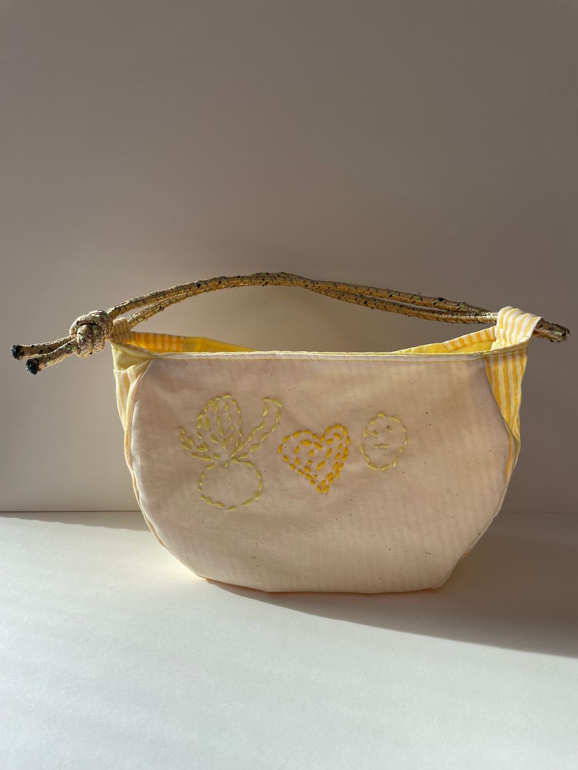 embroidered bucket bag by Veronica Seibert