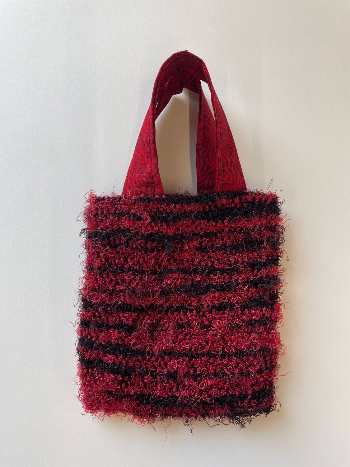 handwoven fluffy bag by Keishla Rosado