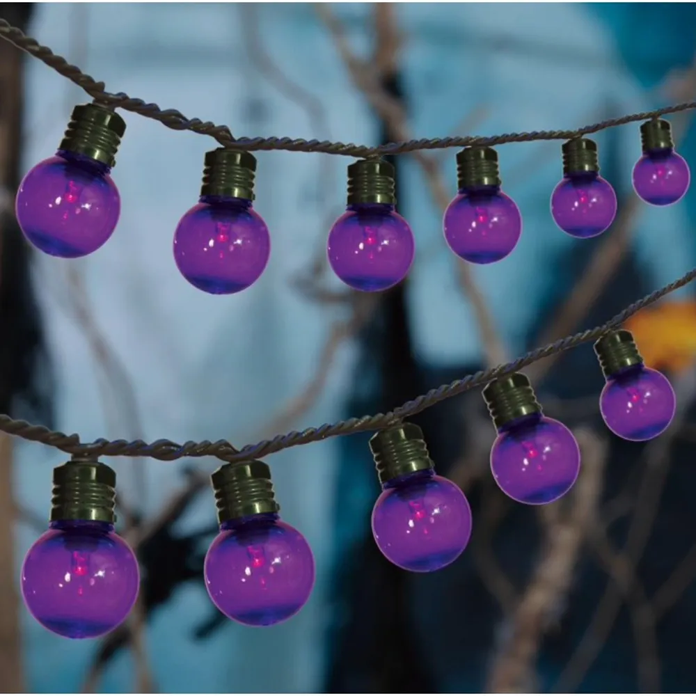 Spooky Village™ 20 Count LED Flickering Fun G40-Style Globe Lights: Purple Bulbs