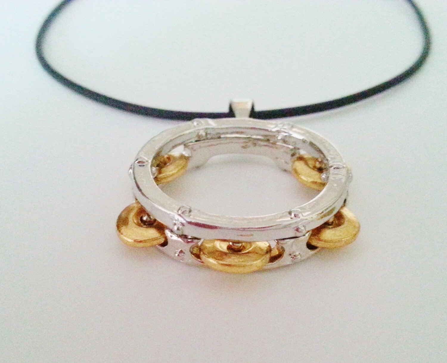 Tambourine Necklace Mixed Metals stainless steel and brass