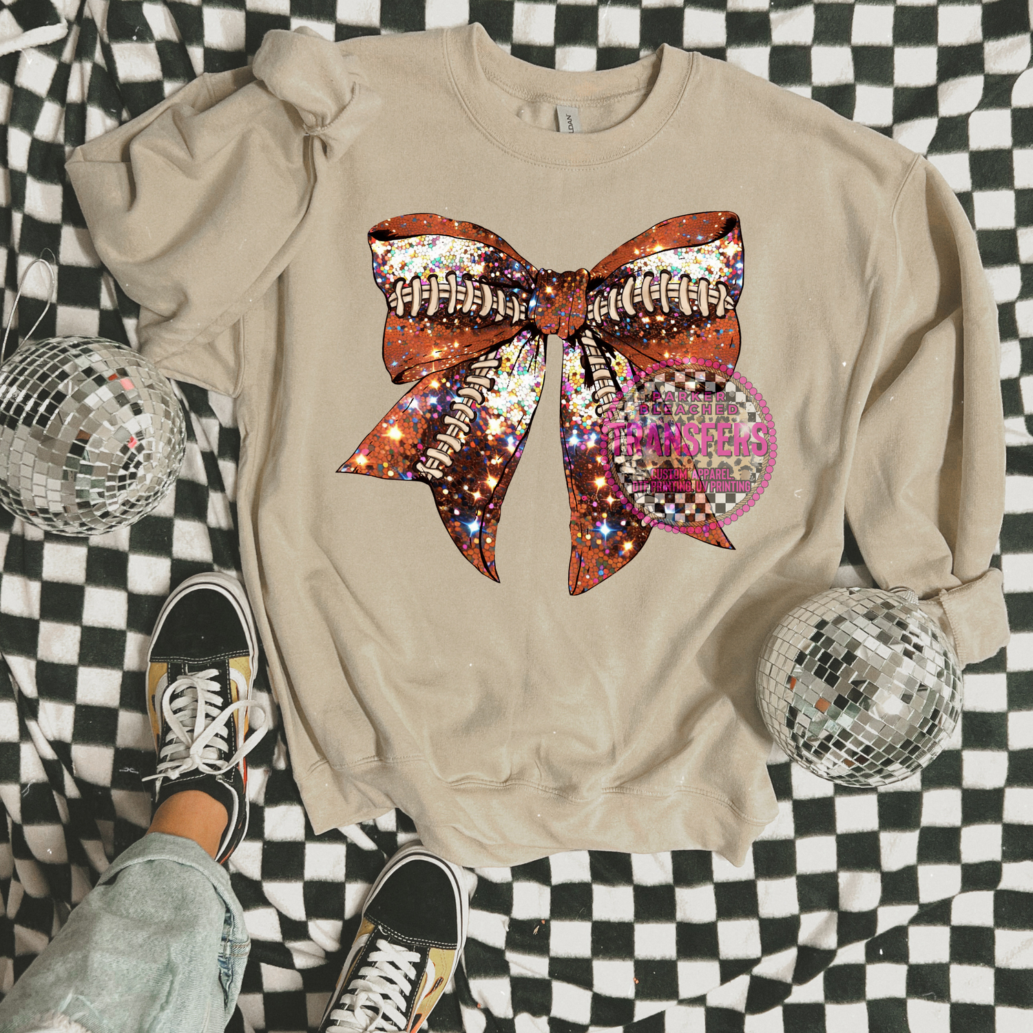 SPARKLY FOOTBALL BOW