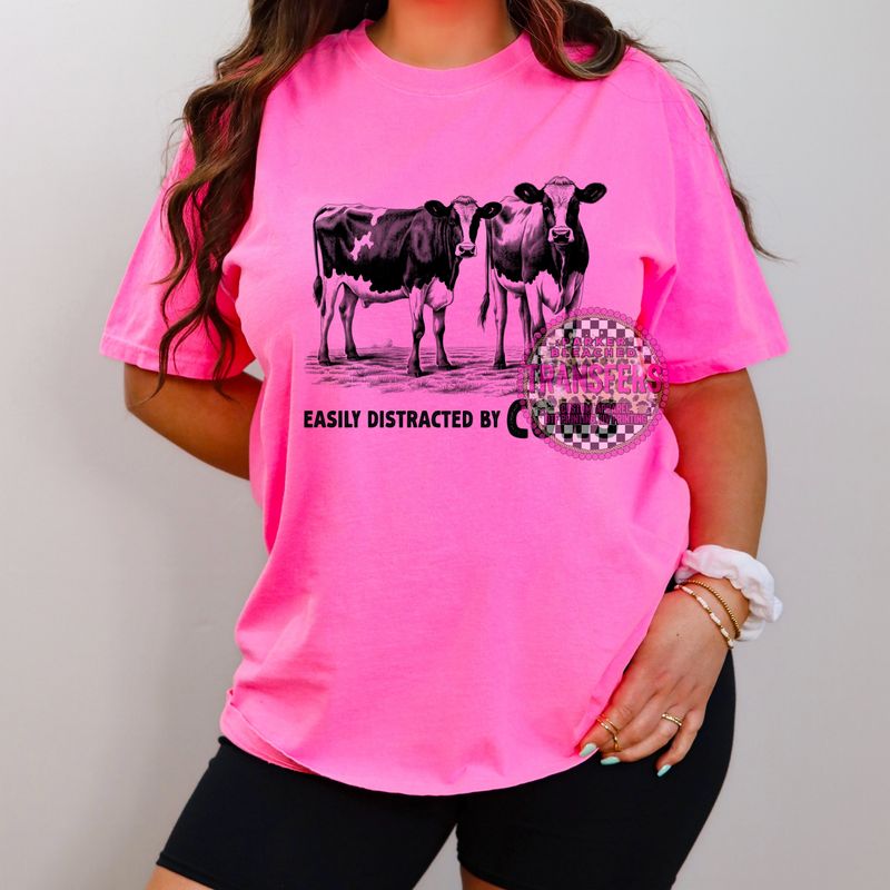 EASILY DISTRACTED BY COWS