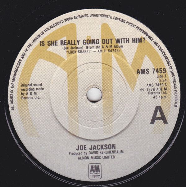 Joe Jackson - Is She Really Going Out With Him? (7&quot;, Single) (Near Mint (NM or M-))