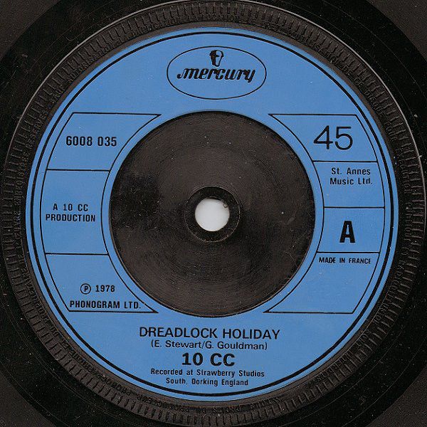 10 CC* - Dreadlock Holiday (7&quot;, Single, Blu) (Near Mint (NM or M-))