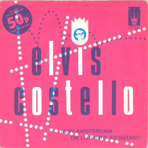 Elvis Costello - New Amsterdam / Dr Luther&#39;s Assistant (7&quot;, Single) (Very Good Plus (VG+))