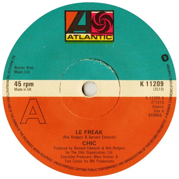 Chic - Le Freak  (7", Single, Dar) (Near Mint (NM or M-))