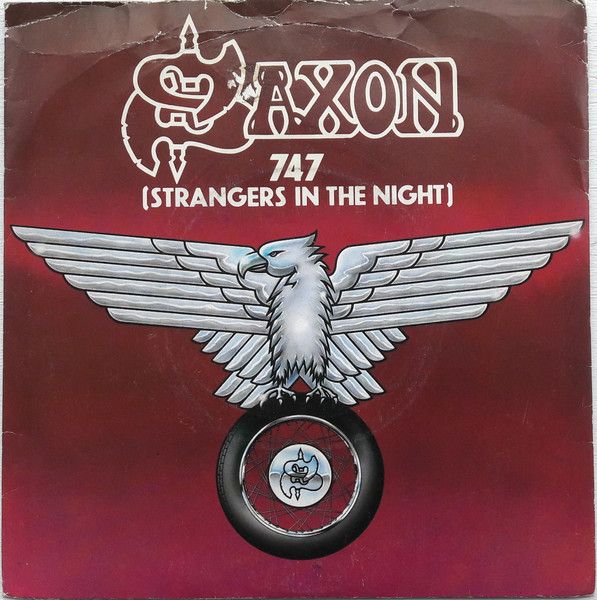 Saxon - 747 (Strangers In The Night) (7", Single, WEA) (Near Mint (NM or M-))