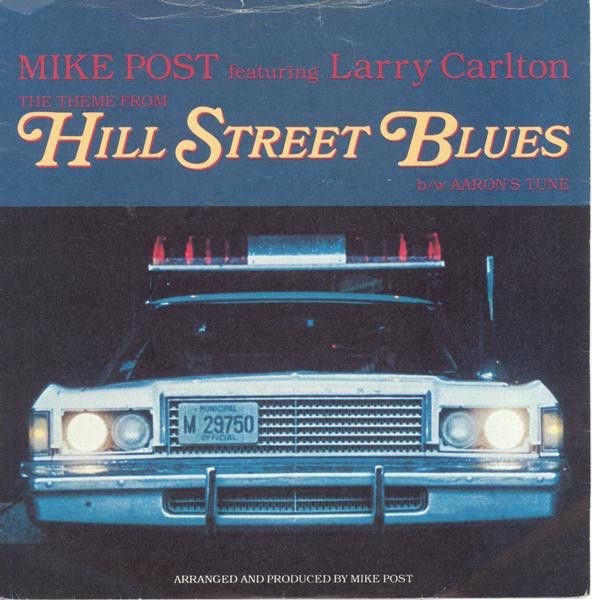Mike Post Featuring Larry Carlton - The Theme From Hill Street Blues (7", Single, Red) (Near Mint (NM or M-))
