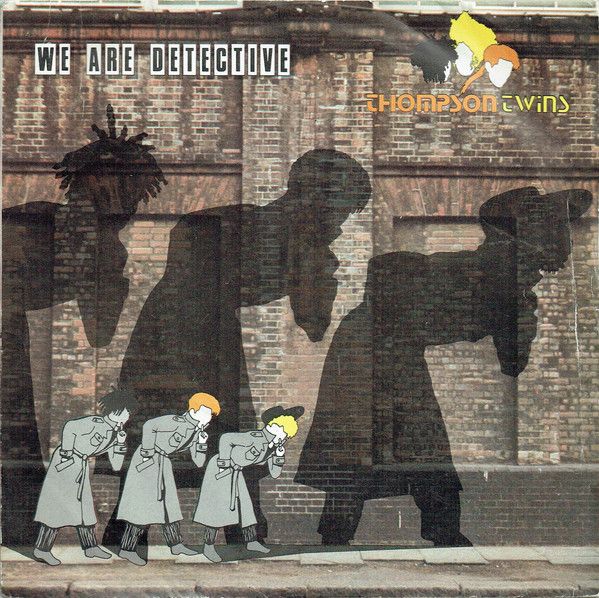 Thompson Twins - We Are Detective (7", Single, Lar) (Near Mint (NM or M-))