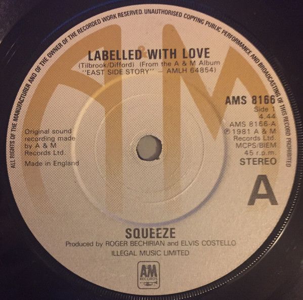 Squeeze  - Labelled With Love (7", Single, Sil) (Very Good Plus (VG+))