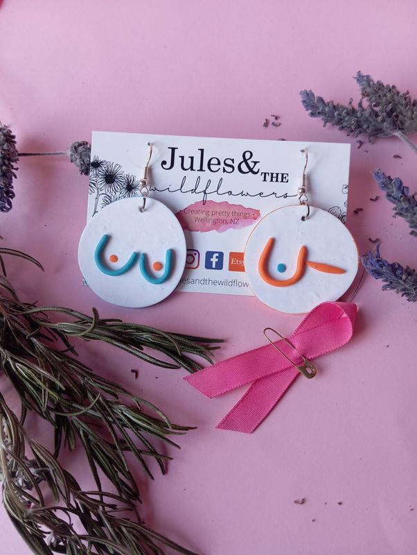 Pink October - Large blue and orange boobs