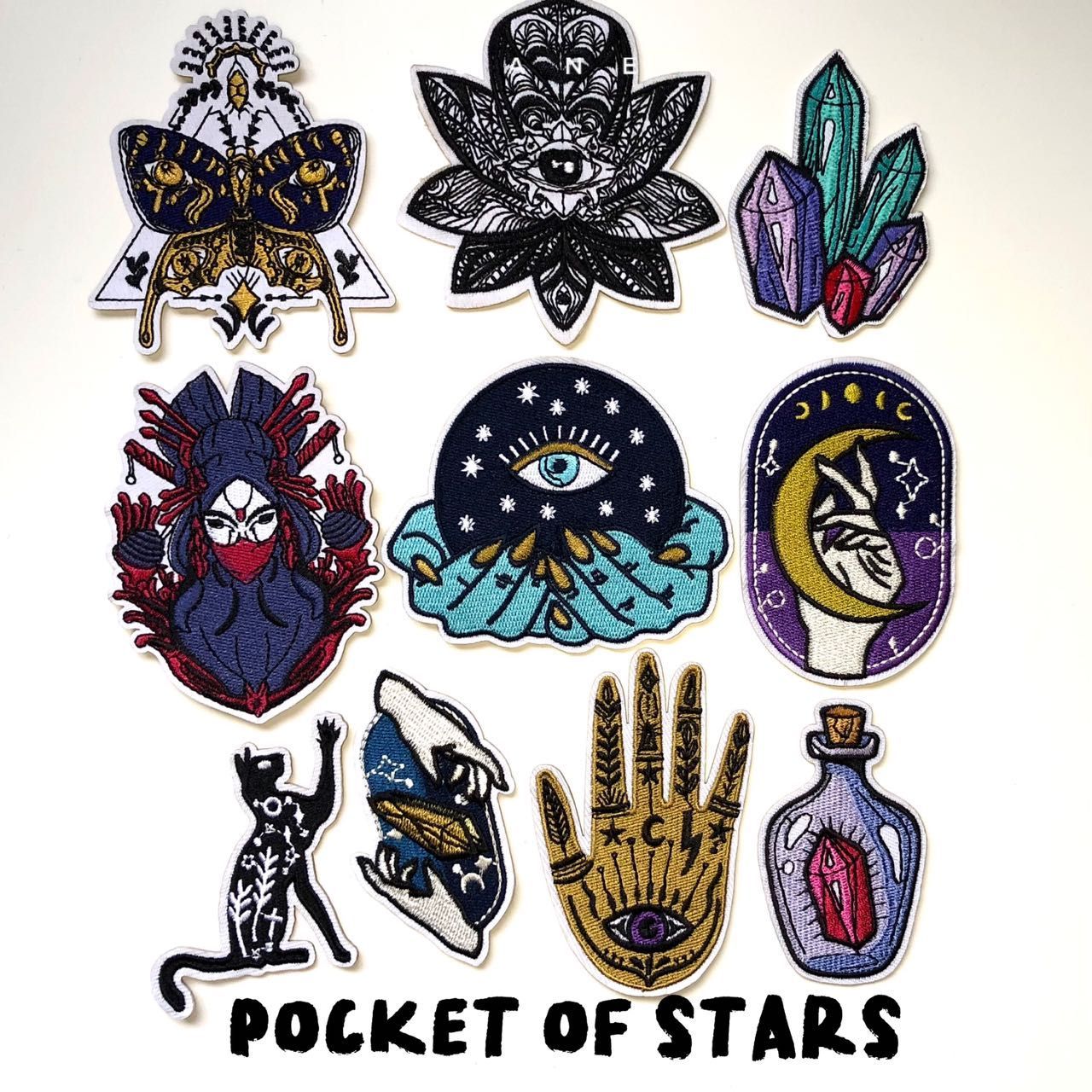 Mystical and occult-themed embroidered patches