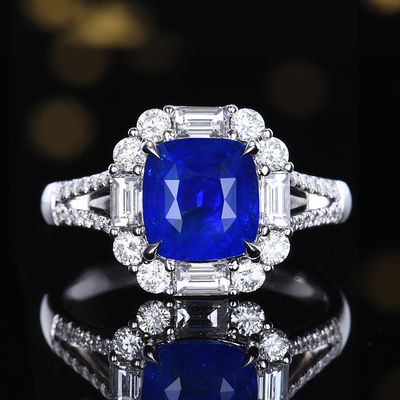 2.5ct Cushion Cut Royal Blue Sapphire set in 18k white gold with diamonds