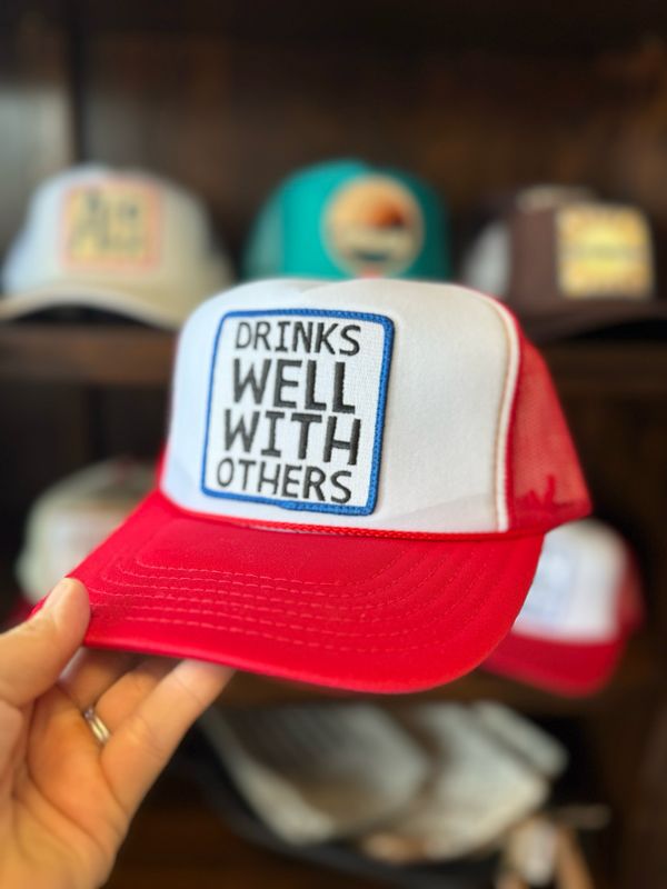 Drinks Well With Others Trucker Hat