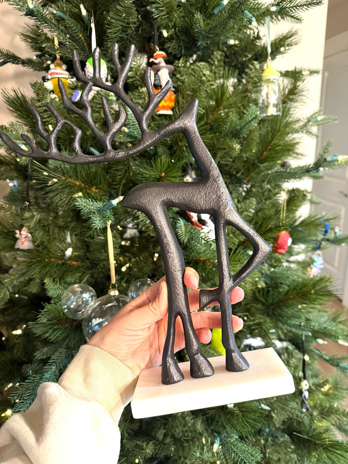 Iron Reindeer On Marble Stand